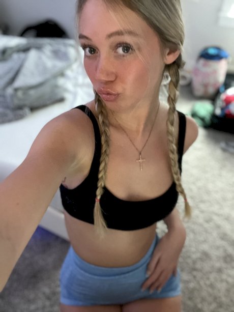 Blonde teen Kayla Pufff shows her petite body wearing sexy lingerie on a bed - Photo 9