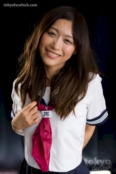Cute Japanese girl endures a hardcore face fuck in her sailor uniform - Photo 1