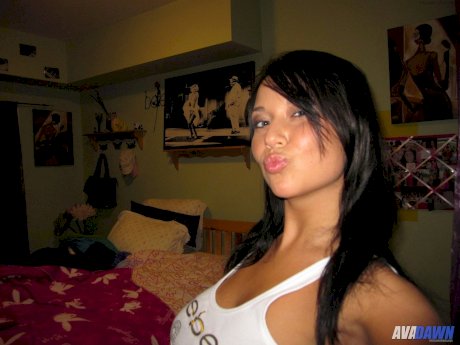 Dark haired amateur Ava Dawn exposes her big naturals during self shot action