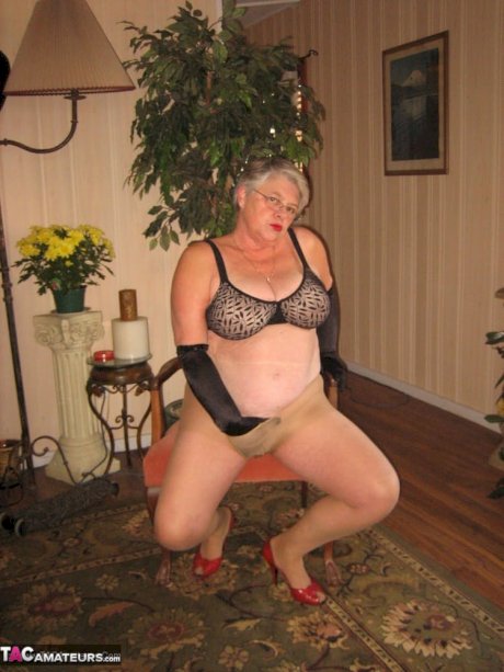 Old fatty Girdle Goddess fondles saggy tits in black velvet gloves and hose - Photo 13