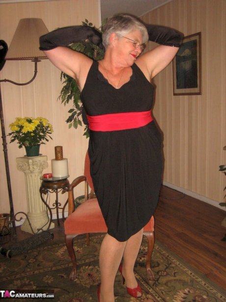 Old fatty Girdle Goddess fondles saggy tits in black velvet gloves and hose porn pics