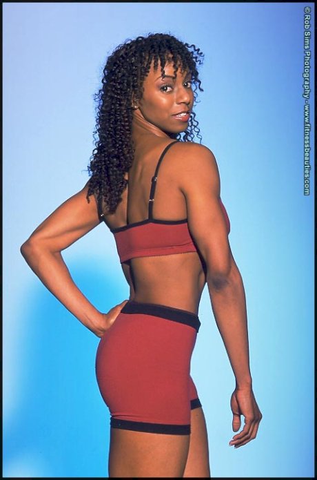 Ebony fitness model Madison Chase poses in activewear and lingerie as well