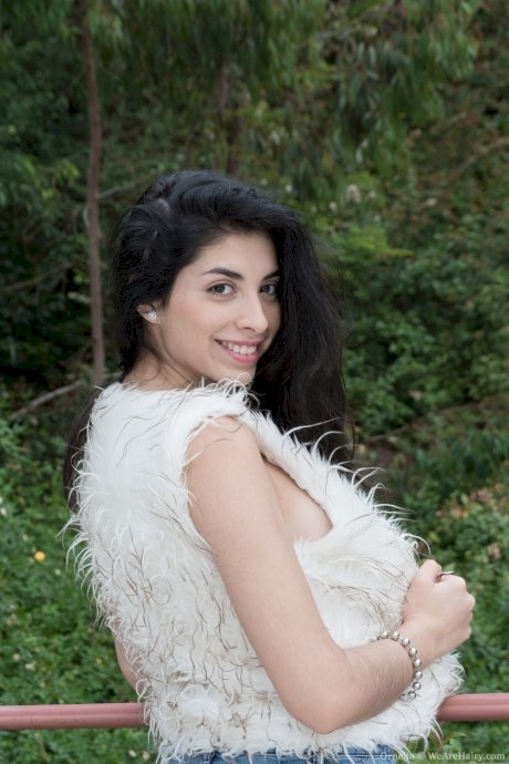 Breathtaking brunette Ornella strips & spreads her super hairy muff in public
