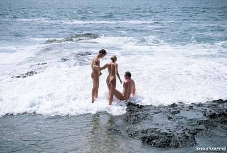 Hungarian MILF Nikki Montana gets spit roasted in a hot FFM 3some at the beach