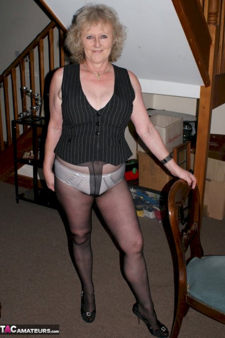Dirty granny in pantyhose Claire Knight fingers her own soft mature cunt