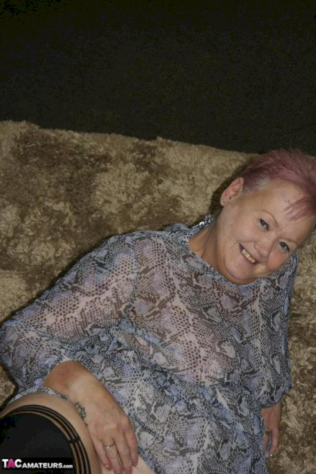 Fat nan Valgasmic Exposed casts off her dress to go naked in black stockings