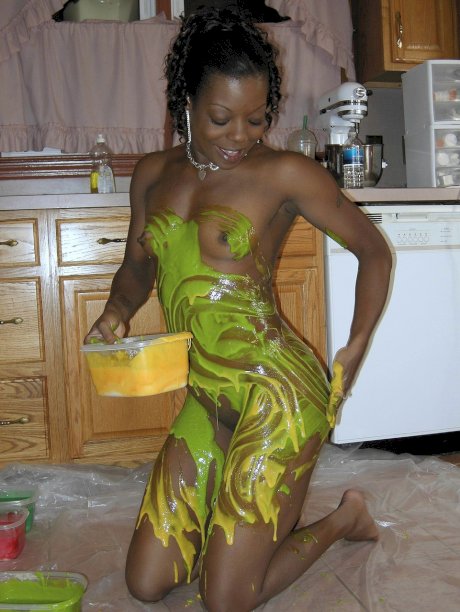 Ebony amateur Anastasia covers her hot body with paint in the kitchen