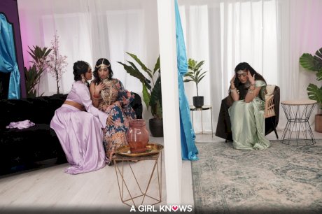 Horny Indian lesbians give each other a pussy licking in a wild threesome