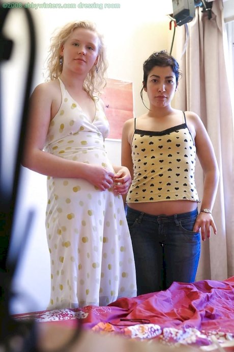 Spy camera catches two lesbians getting dressed after having sex - Photo 16