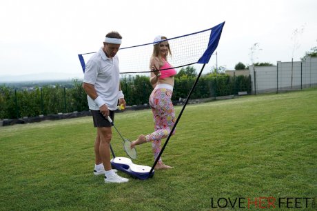 Russian teen with big boobs Candy Alexa gives her badminton coach a footjob