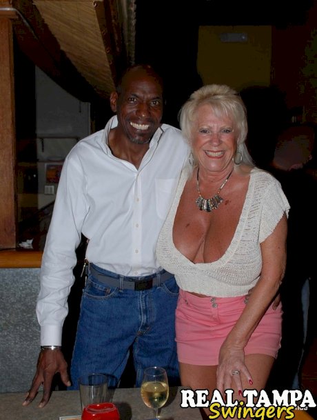 Mature lady Tracy Lick introduces her swinging friends at a party