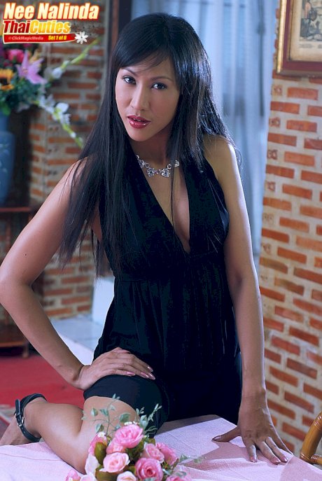 Beautiful Asian girl Nee Nalinda slips off a black dress to get naked in heels