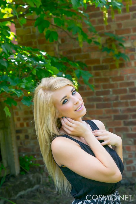 Busty blonde Jodie takes off her clothes outdoors to sun her saggy tits