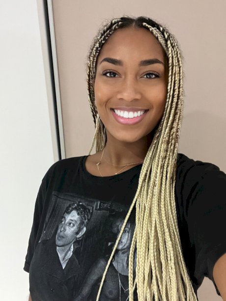 Ebony solo model Laila Santiagoo sports a nice smile during SFW action