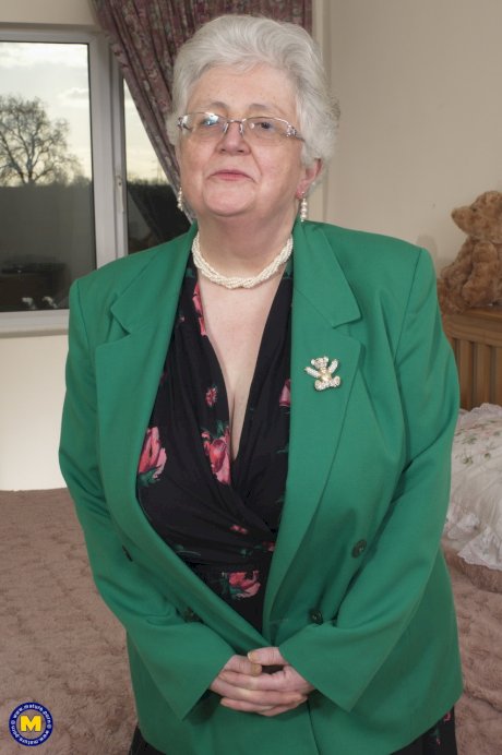 BBW granny with glasses Caroline V strips to her lingerie & masturbates