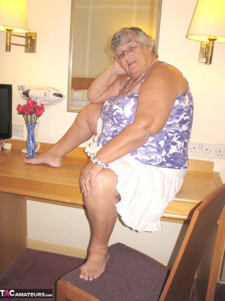 Fat British nan Grandma Libby completely disrobes while in a hotel room