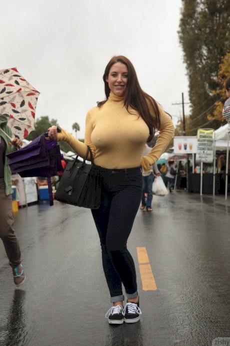 Curvaceous babe Angela White strips her bra and teases with her nips in public