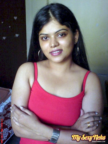 Indian chick Neha uncovers her natural tits during solo action