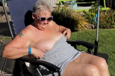 Fat nan Valgasmic Exposed shows her tits and snatch on a backyard lounge chair