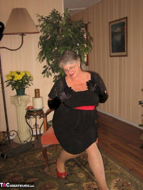 Old fatty Girdle Goddess fondles saggy tits in black velvet gloves and hose - Photo 2