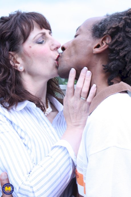 Horny British mature Toni Lace kisses a black dude and rides his huge boner