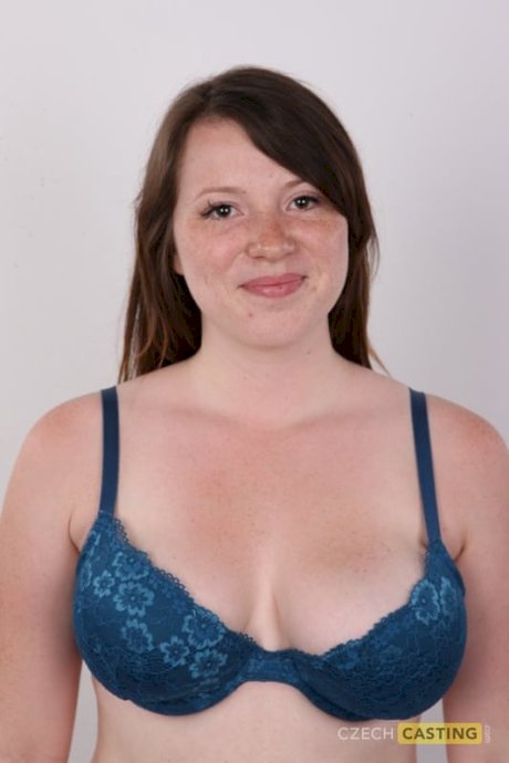 Chubby redhead undresses to stand naked and show her big tits and big butt - Photo 6