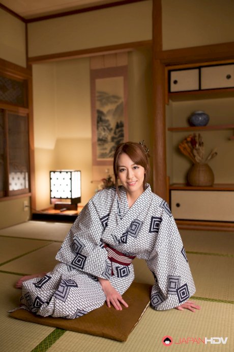 Japanese beauty Akari Asayiri teases in a kimono as well as a summer dress - Photo 1