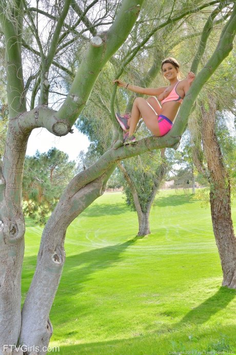 Petite blue-eyed brunette Lana strikes sexy nude poses outdoors