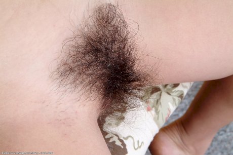 Latina Nancy's juicy pussy lips are surrounded by her thick hairy bush - Photo 6