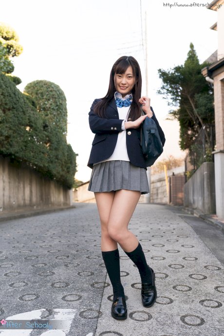 Japanese schoolgirl flashes her upskirt underwear before stripping to socks