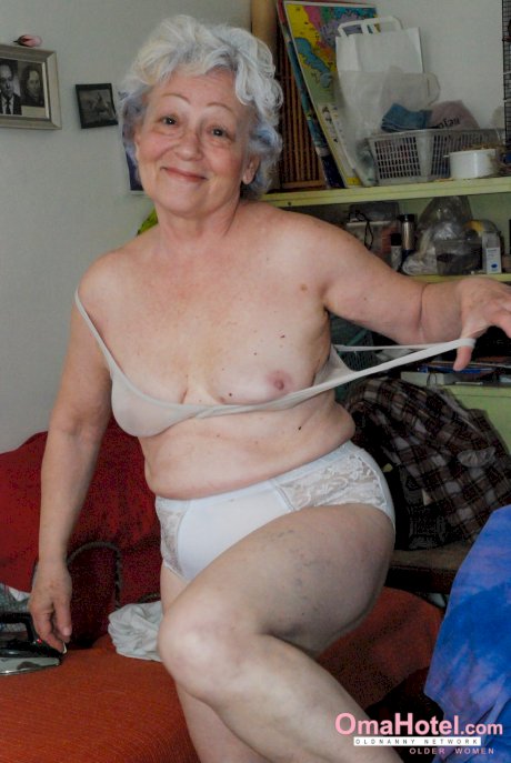 Cock-craving granny Agnes pleasuring her hairy pussy with a dildo