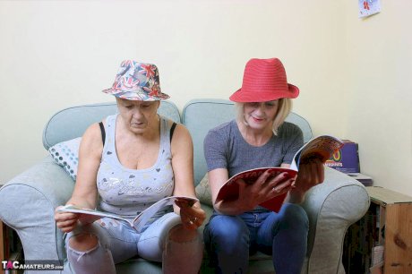 Two old lesbians exposes their big boobs and bare asses together