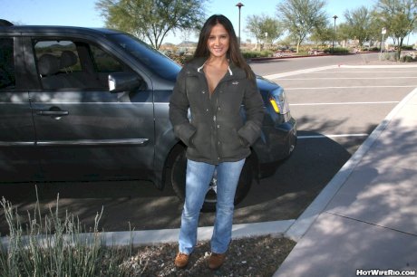 Topless Latina amateur takes off her blue jeans before eating cum from a spoon - Photo 1