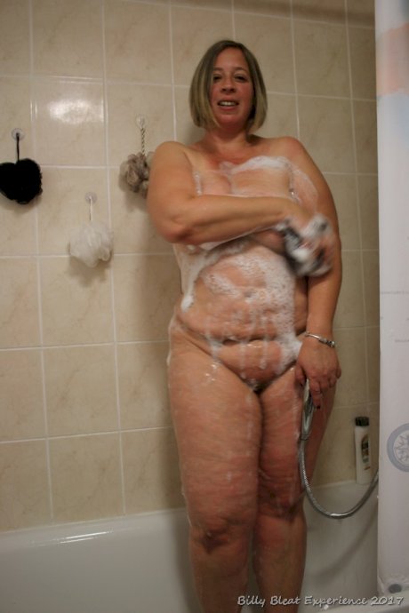 Blonde MILF Shooting Star shows her chubby naked body in the shower