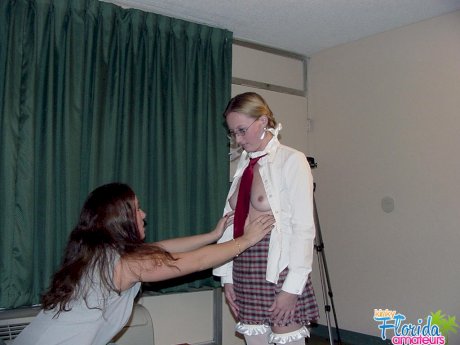 Geeky schoolgirl Candy is introduced to lesbian sex by her teacher Chynna
