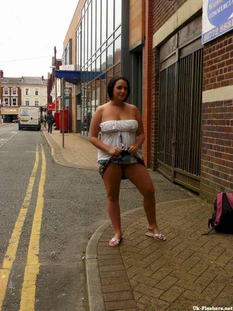 Overweight UK female flashes her tits and big butt on public street