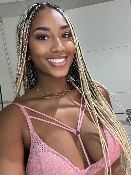 Ebony solo model Laila Santiagoo sports a nice smile during SFW action