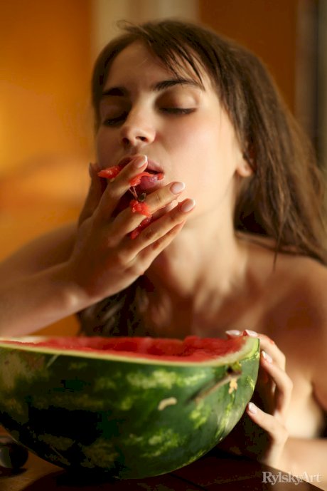 Adorable teen Sofy Bee gets messy while eating watermelon in the nude