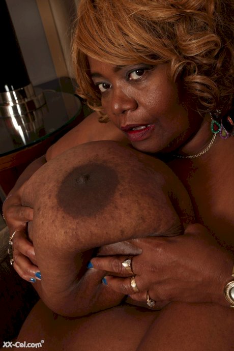 Ebony SBBW Norma Stitz unleashing her giant breasts and showing her fat booty