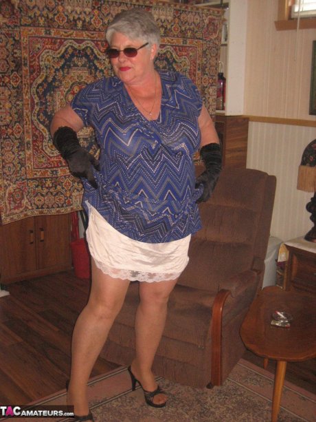 Fat granny Girdle Goddess gets naked in shades, gloves and pantyhose