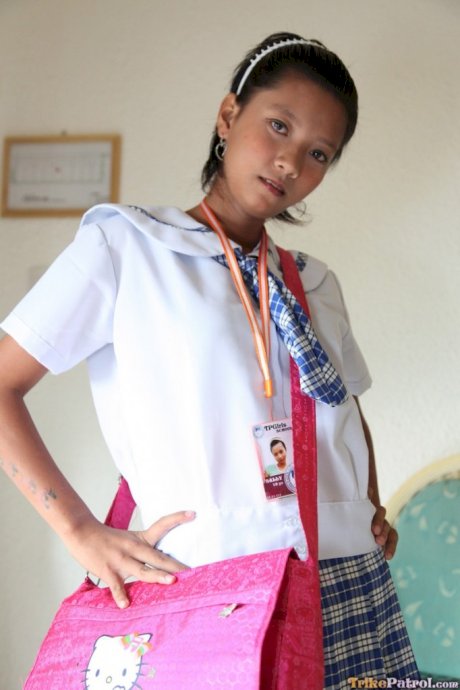 Petite Filipina schoolgirl Sally in uniform flashes panty upskirt & teen pussy