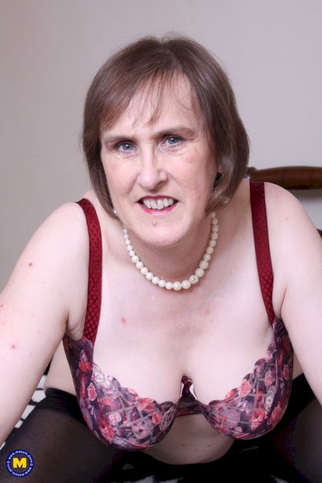Big-breasted granny Allison strips down to her stockings & toys her hairy cunt