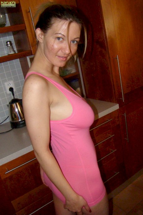 Amateur hottie Vanessa Lovely creams and fondles her big juggs while stripping