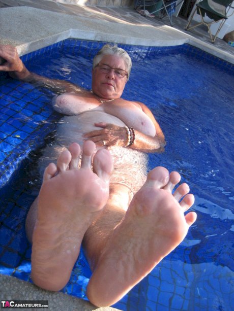 Fat nan Girdle Goddess goes for a skinny dip in a backyard pool