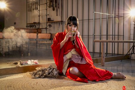 Japanese female Sakura Kurokawa is suspended from the ceiling by rope porn pics