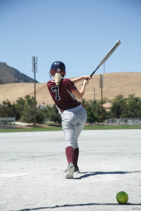 Sporty blonde Morgan Attwood flashing tiny tits & hot ass in a softball field