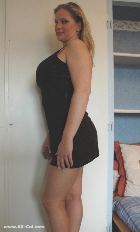 Beautiful amateur MILF in a black dress Zdenka K exposes her sexy legs and ass