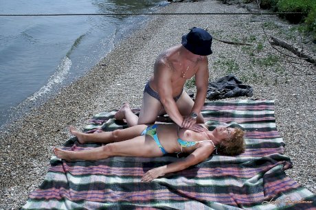 Big busted granny in bikini gives a blowjob and gets shagged outdoor