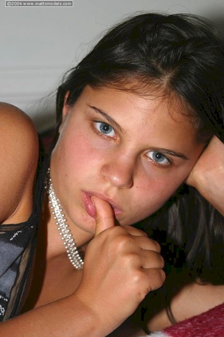 Teen first timer sucks her thumb before showing her trimmed bush in the nude - Photo 2