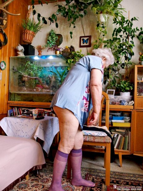 Fat old granny Galfira undresses and poses naked in a solo show